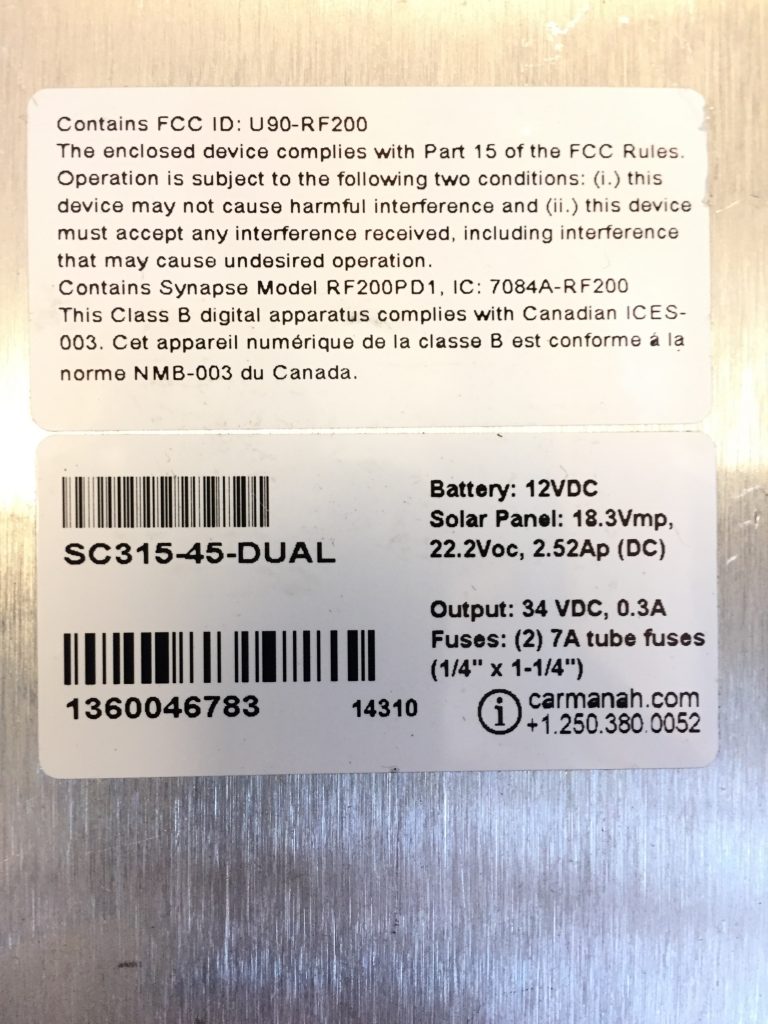 The SC315 system serial number may be located inside the cabinet.