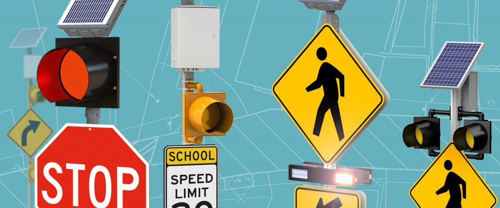 Selection of traffic flashing lights above stop signs, school speed limit signs and crosswalks.