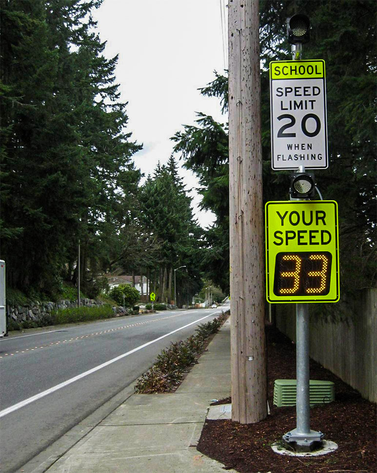 speedcheck radar speed sign flashing 33 in school zone in redmond, wa