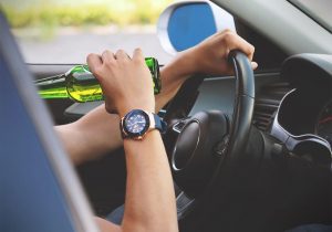 person drinking and driving