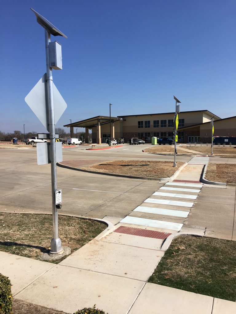 RRFBs high speeds and curves to keep youth safe in Midlothian